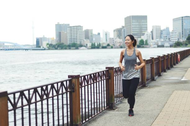 istock Young woman running 1034680650