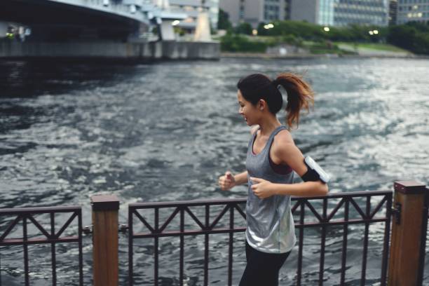 istock Young woman running 1034680754