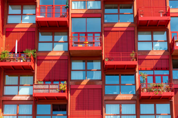 istock Facade of a red apartment house 1034683784