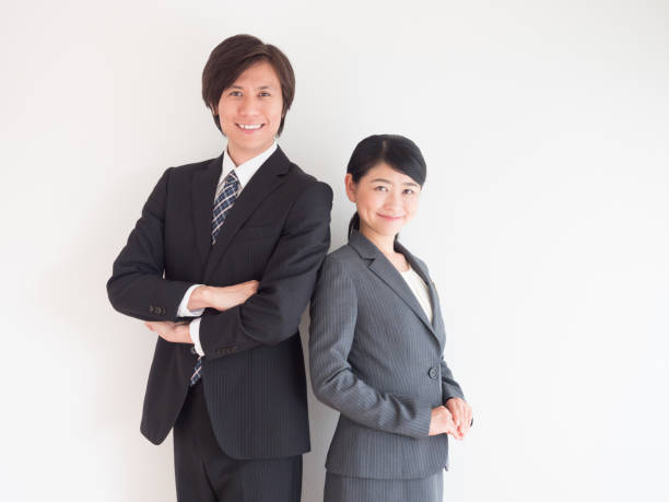 istock asian business group on white background 1034696876