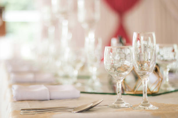 istock Elegant wine glass on dining table 1034719172