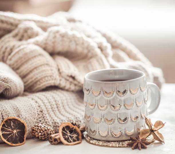istock cozy winter composition with a cup and sweater 1034719368