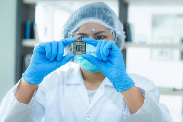 istock Portrait of computer engineer is holding CPU's computer for examination 1034734220