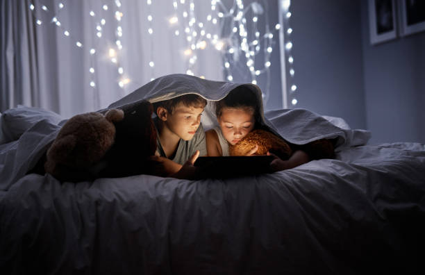 istock These siblings love their cartoons 1034734302
