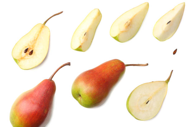 istock pear with slices isolated on white background. top view 1034734698