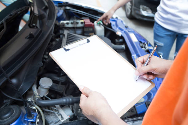istock Auto mechanic in garage, Car service concept 1034746720