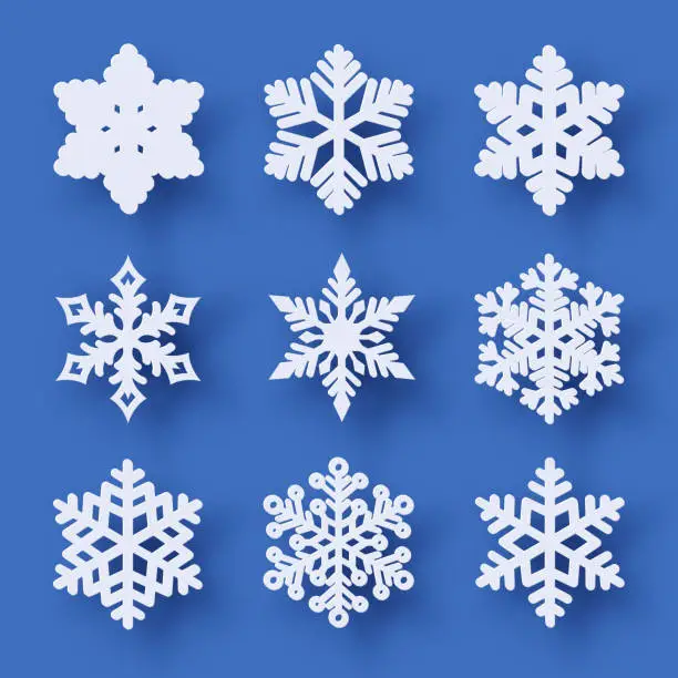 Vector illustration of Vector set of 9 paper cut snowflakes with shadow