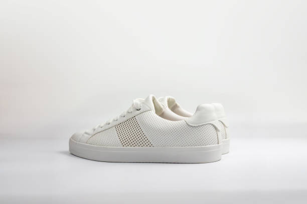 istock White, new and clean sneaker shoes on white background 1034753620