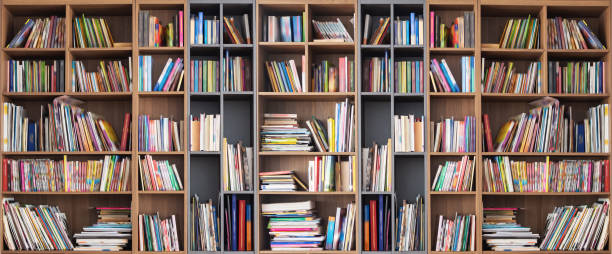 istock Wide book shelves with blurry effect on book cover 1034753636