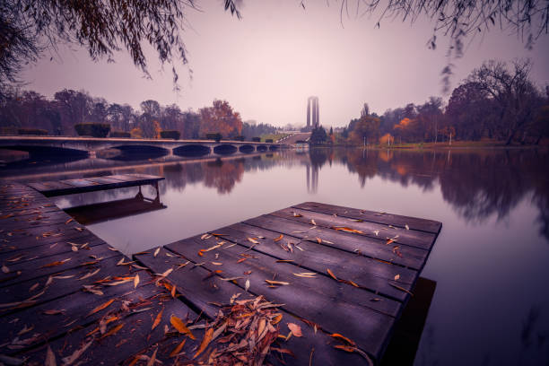 Splendid autumn scene in a park near the lake by a pontoon stock photo