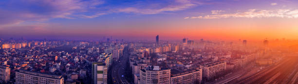 High resolution beautiful panorama in the morning over the city with very vibrant colors multiple exposure shot with many architectural details stock photo