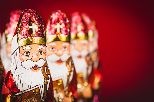 Close up of Sinterklaas figurines. Saint Nicholas chocolate figures of Dutch character of Santa Claus.with copy-space
