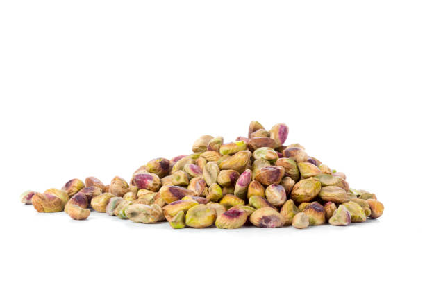istock Pistachio nuts isolated on white background 1034757754