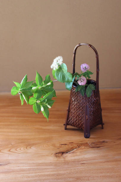 Japanese room: flowers in the vase and a antique pot