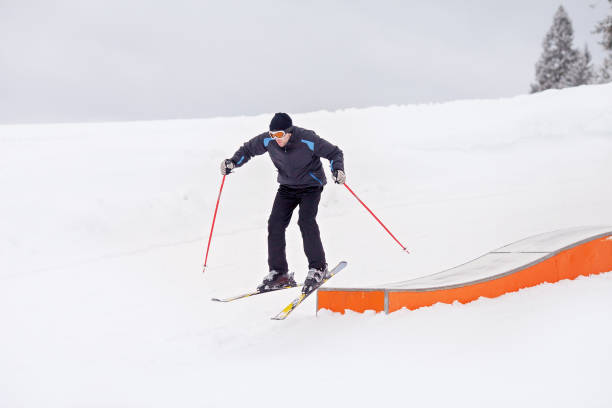 istock Young skier, skiing in a Austrian mountain resort 1034765970