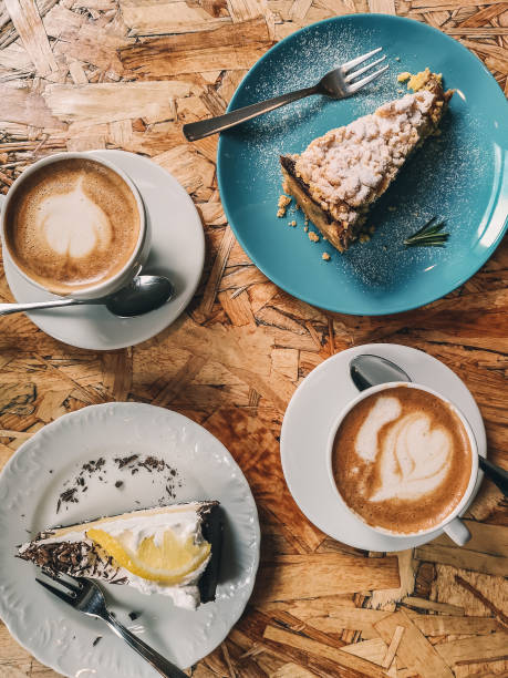 Vegan Cake and coffee from above overhead\nPhoto taken with mobile camera in natural light