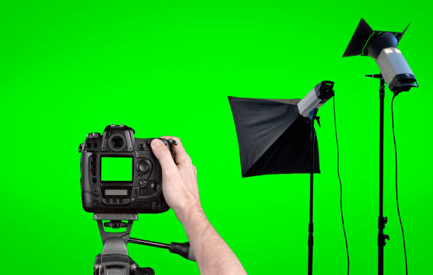 istock Studio lighting equipment isolated on Green background 1034772794