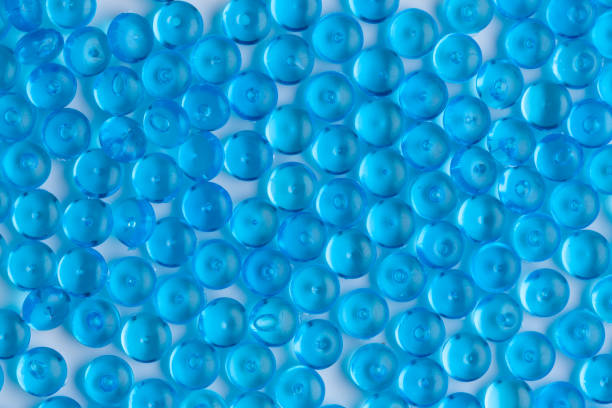 istock Blue acrylic beads on a white background 1034783498