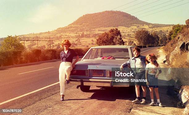Vintage Image Of A Family On The Roads Stock Photo - Download Image Now - Retro Style, Old-fashioned, Archival