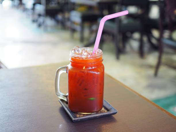 istock A refreshing glass of iced lemon tea on the table. 1034787582