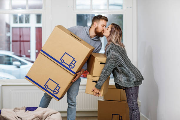 istock Young couple moving into a new house 1034789186
