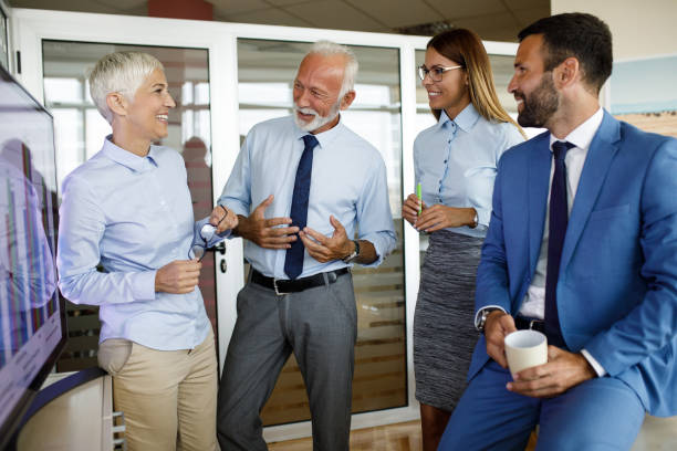 istock Group of business people during presentation 1034799238