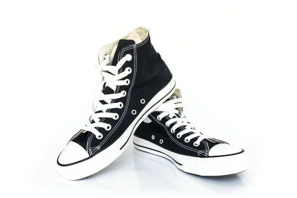 istock black sneakers classic vintage shoe on white background 1034807698