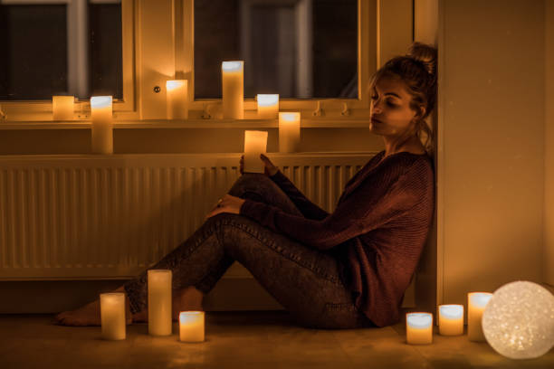 istock Young couple surrounded by candles 1034811578