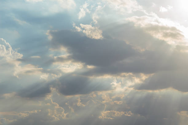 istock sky season rain storm clouds sunlight rays of light 1034826014