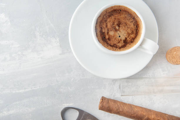 istock Cup and Turk coffee, cigar and guillotine isolated on white background. 1034829702