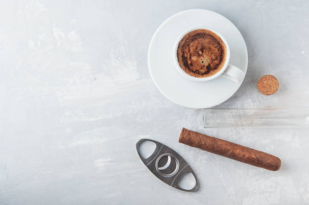 istock Cup and Turk coffee, cigar and guillotine isolated on white background. 1034829914