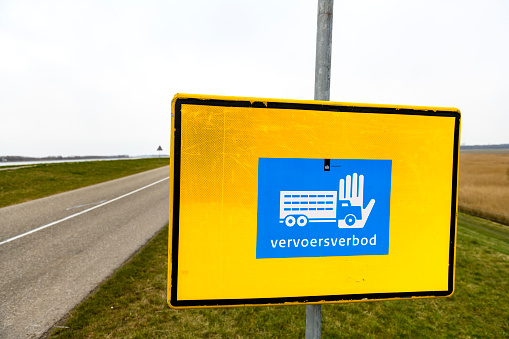 No livestock transport warning sign in Dutch after disease outbreak of bird flu or Foot and Mouth Disease.