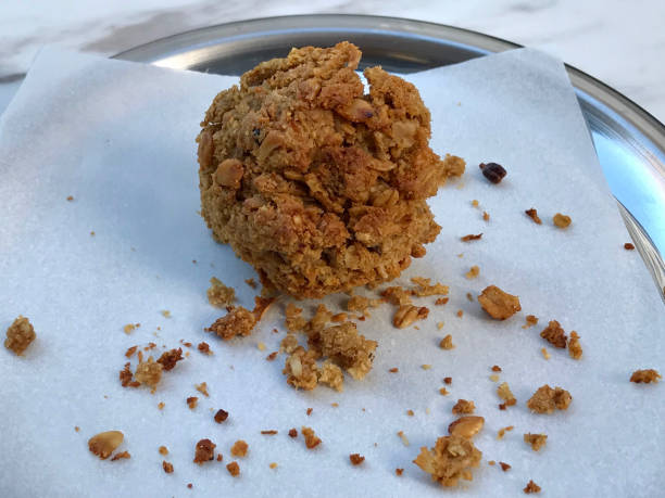 istock Oatmeal Cookie served on Silver Plate with Paper 1034835482