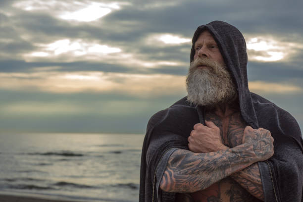 istock Tattooed Senior Man During Workout 1034836370