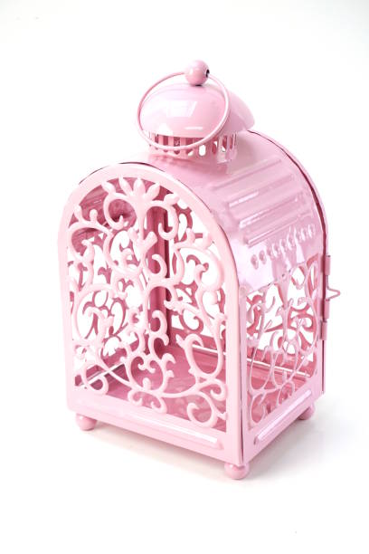 istock pink candle light lantern home decoration isolated on white background 1034842094