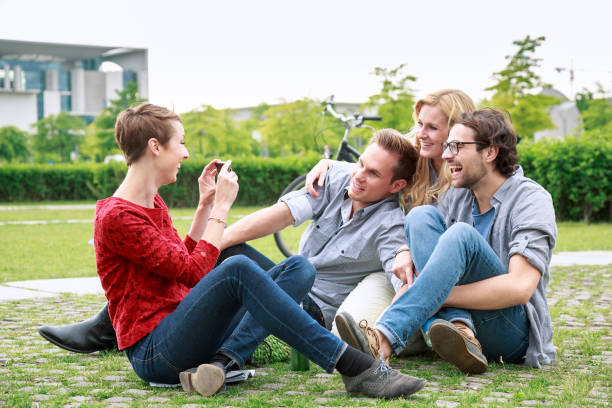 istock Group of friends having photo together. 1034844568