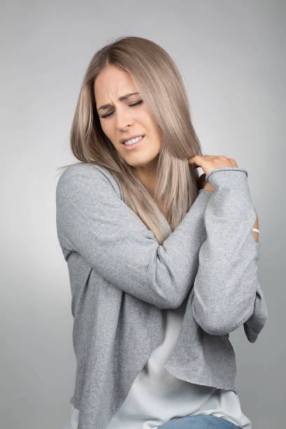 istock woman has a painful shoulder 1034849762