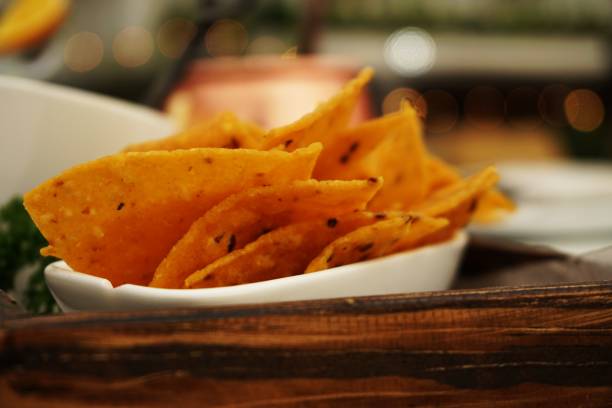istock nachos chips with tomato salsa and guacamole 1034850672