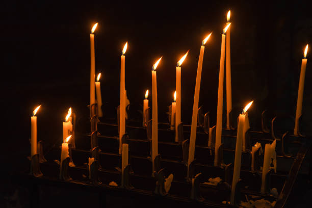 istock High candles in catholic cathedral 1034858194