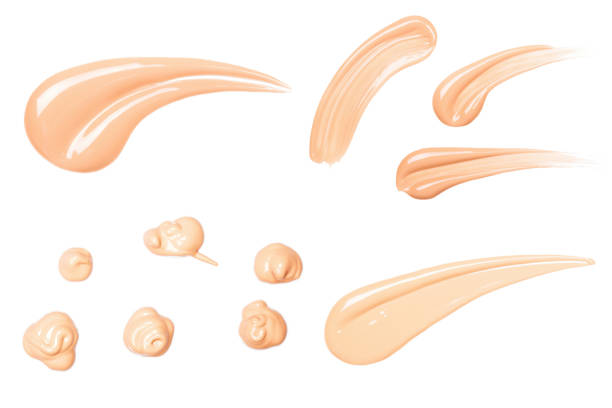 Three smears of foundation Three smears of foundation. Beautiful advertising glance photo. Cosmetics concept isolated on white liquid foundation face stock pictures, royalty-free photos & images