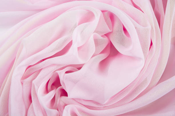 istock Texture chiffon fabric pink color for backgrounds 1034876266