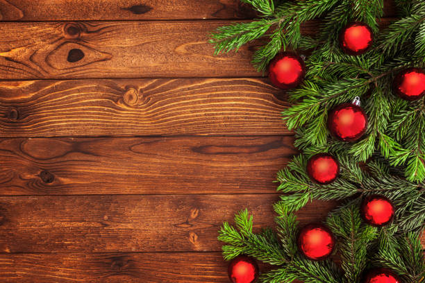 istock Christmas fir tree with decoration on a wooden board 1034881506