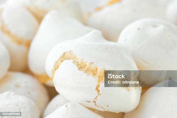 Pile Of Freshly Backed Homemade Meringue Cookies At Farmers Market Artisan Local Pastry Creamy Texture Pastel Colors French Dessert Confectionery Concept Food Poster Stock Photo - Download Image Now