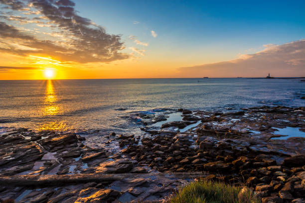 istock Sunrise at Seaton Sluice 1034906828