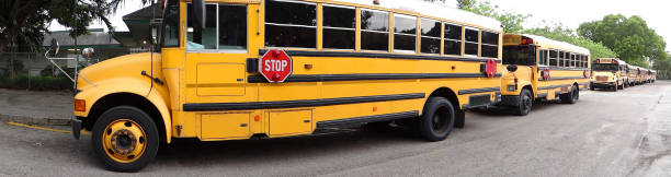 istock Long line of school buses 1034912822