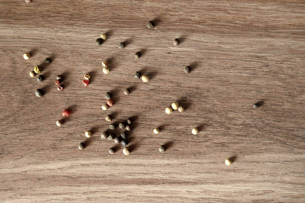 istock Pepper mix on wooden table 1034918328
