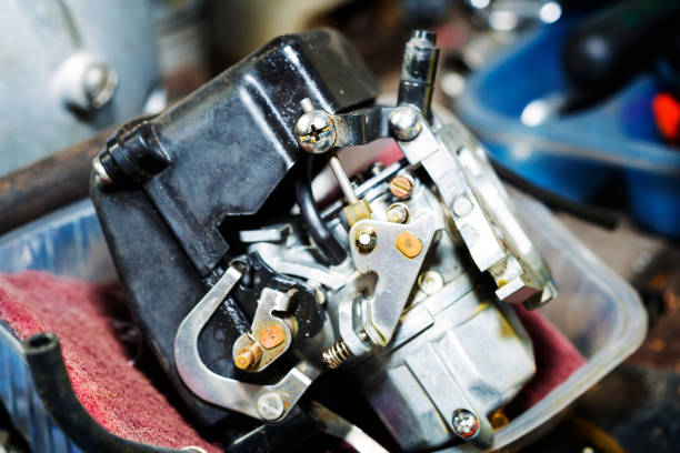 istock Old car outboard carburator 1034920154