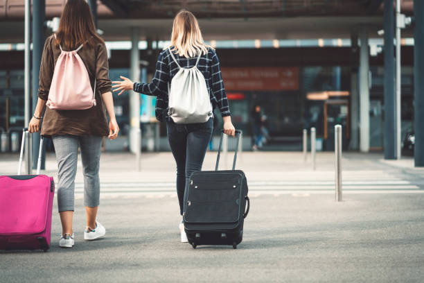 istock Two college friends going on vacation 1034932618