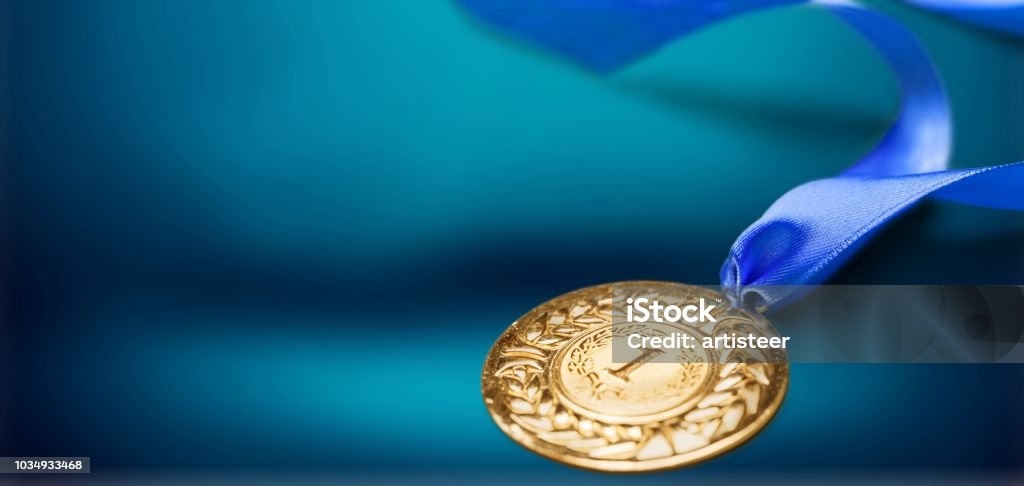 Medal. Gold medal with  ribbon  on  background Award Stock Photo