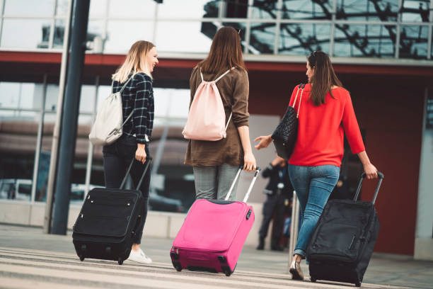 istock Three friends, leaving town, for weekend trip to Paris 1034934510